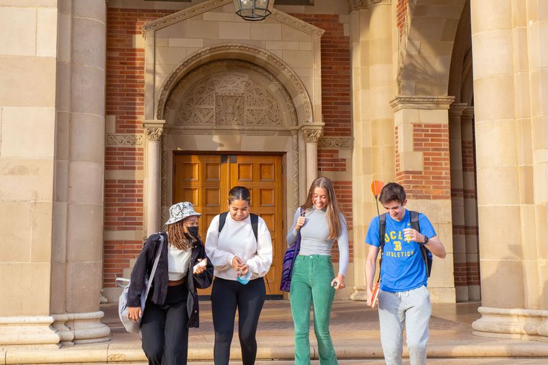 Students walking away from a building at UCLA