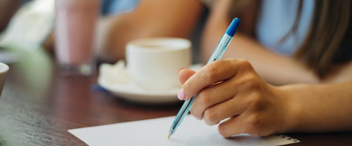 Writing on a notebook